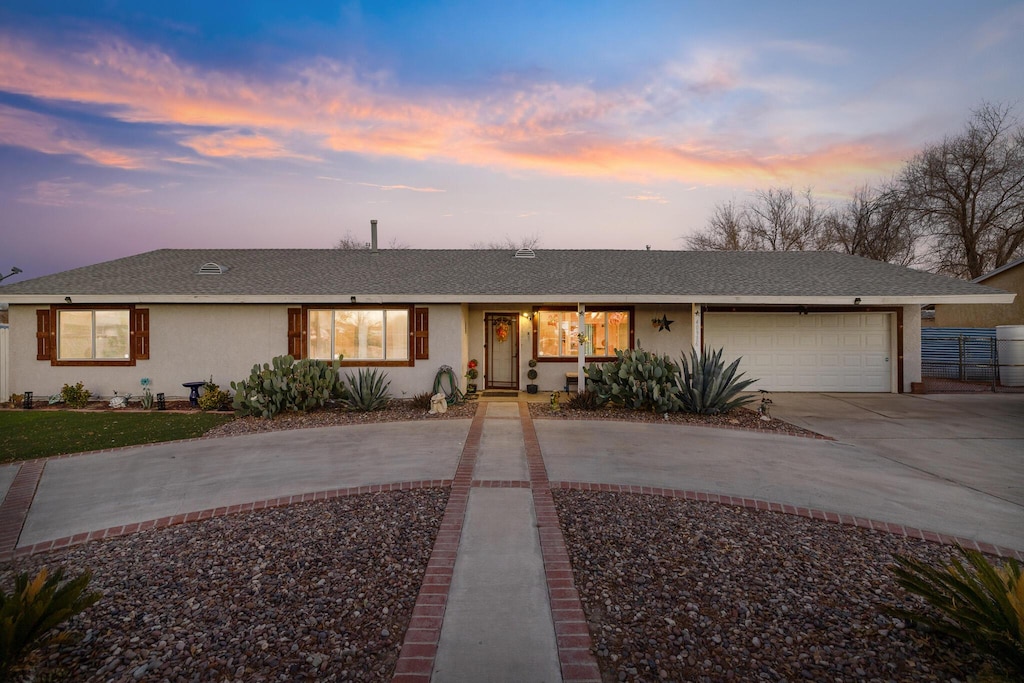 ranch-style home with a garage