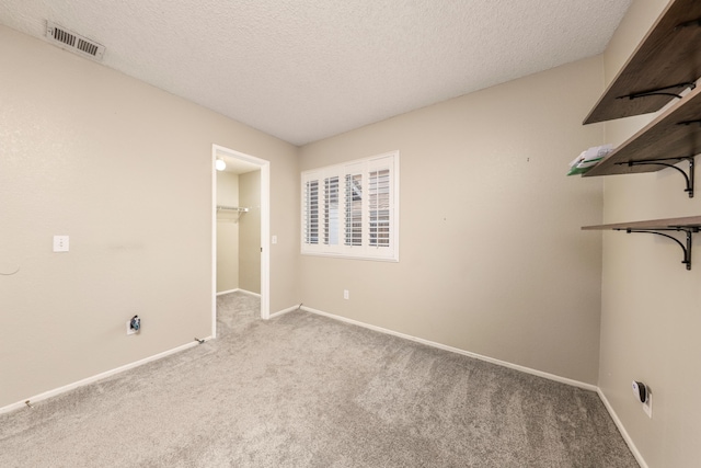 interior space with a textured ceiling