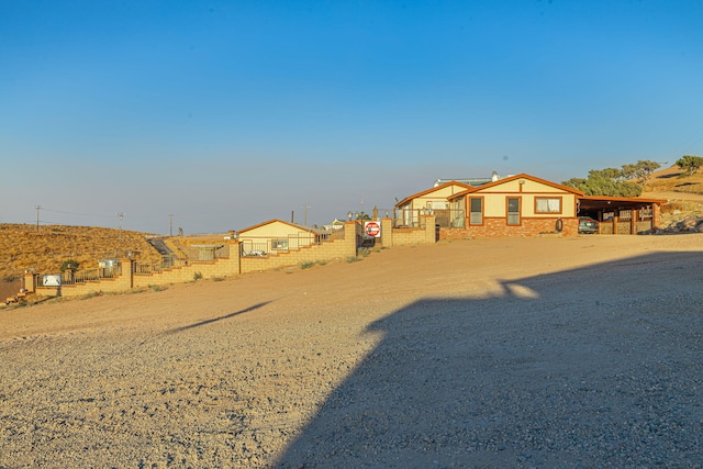 view of yard with a carport