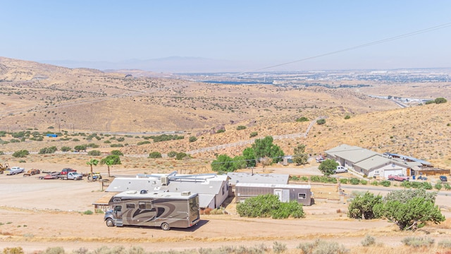 drone / aerial view featuring a mountain view