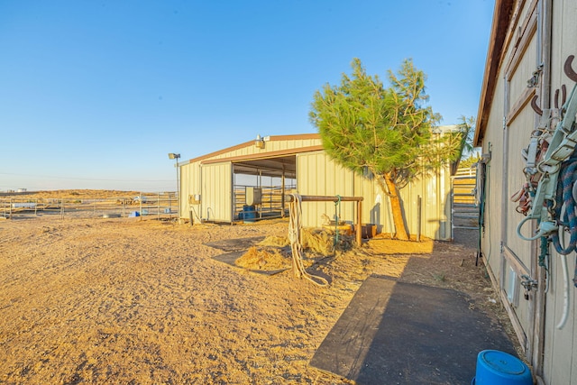 view of outbuilding with a rural view