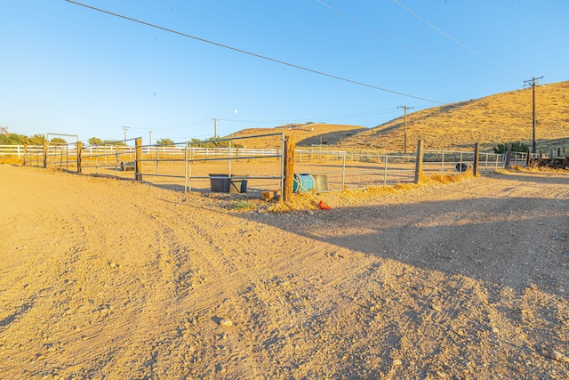 exterior space with a rural view