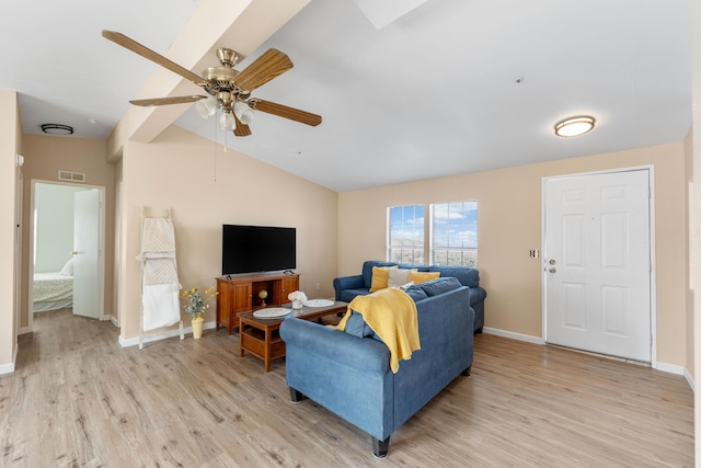 living room with vaulted ceiling, ceiling fan, and light hardwood / wood-style floors