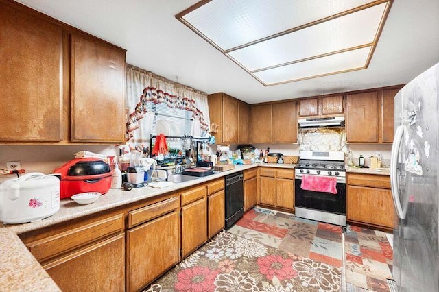 kitchen featuring stainless steel appliances and sink