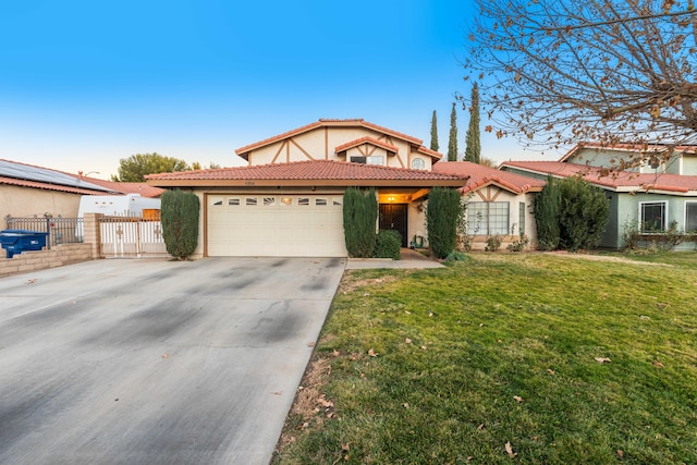 view of front facade with a front yard and a garage