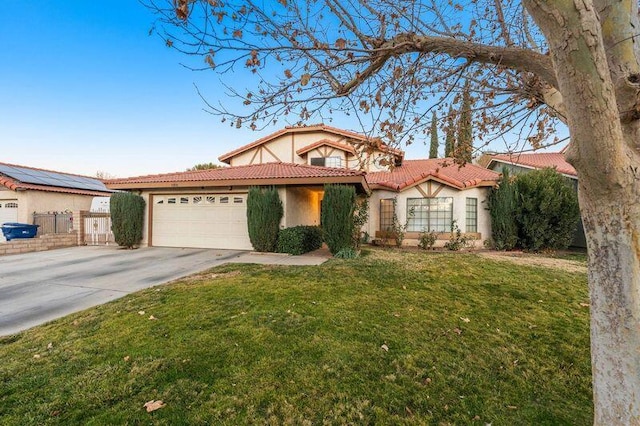 view of front of house featuring a garage and a front yard