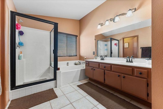 bathroom featuring shower with separate bathtub, vanity, tile patterned floors, and vaulted ceiling