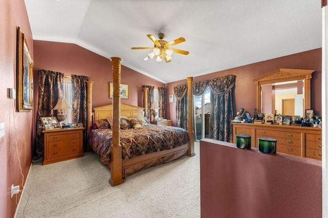 bedroom with carpet flooring, vaulted ceiling, and ceiling fan