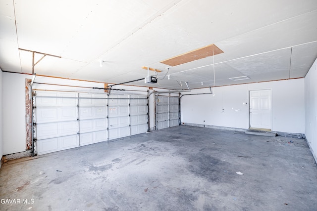 3807 Paula Ln, Lancaster, CA 93535 - garage featuring a garage door opener