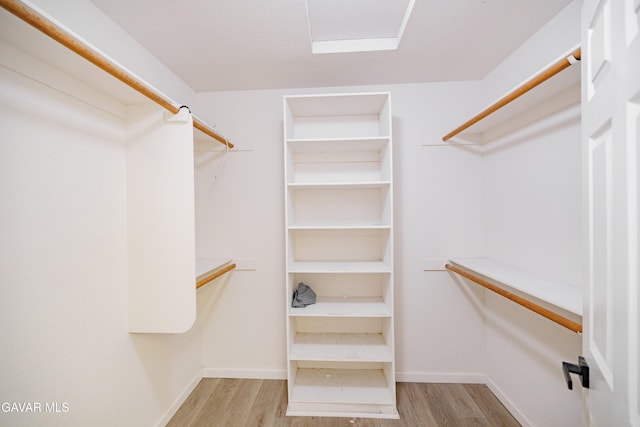 3807 Paula Ln, Lancaster, CA 93535 - spacious closet featuring wood finished floors