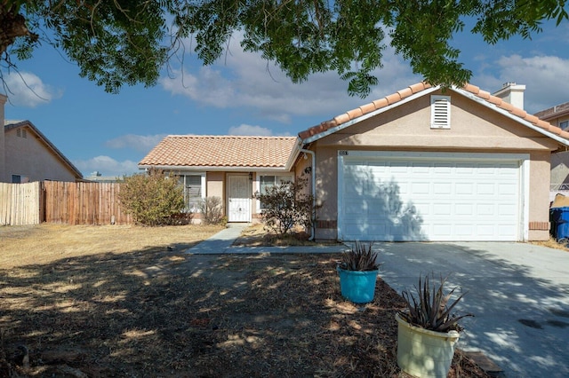 ranch-style home with a garage