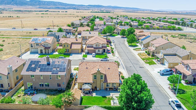 aerial perspective of suburban area featuring mountains