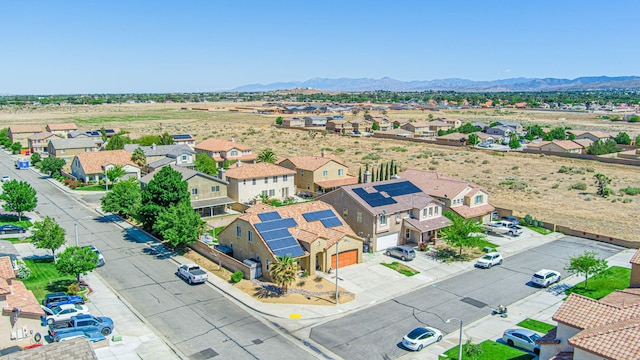 aerial perspective of suburban area with a mountain backdrop