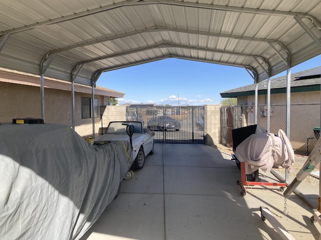 view of parking / parking lot with a carport