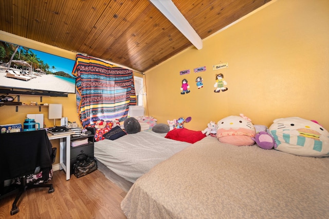 bedroom featuring light wood-type flooring, vaulted ceiling with beams, and wood ceiling