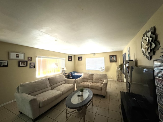 tiled living room with plenty of natural light