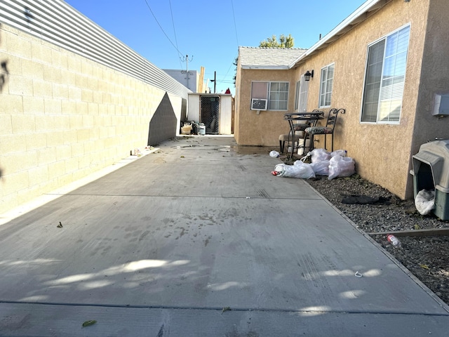 view of patio / terrace with area for grilling and fence