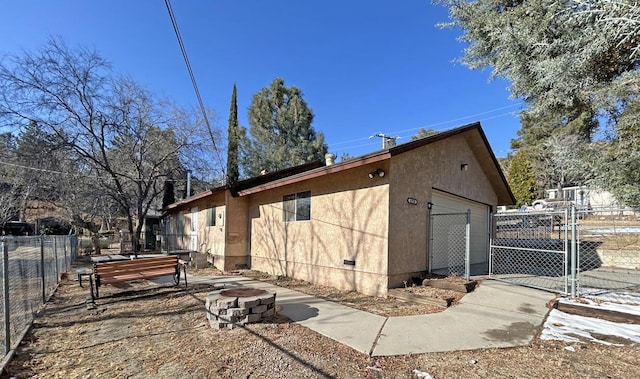 view of property exterior featuring a garage