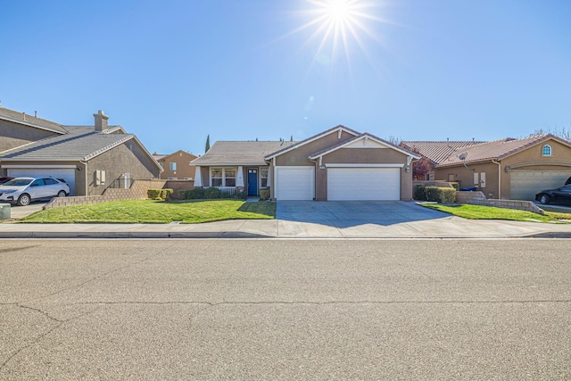 single story home with a front lawn and a garage