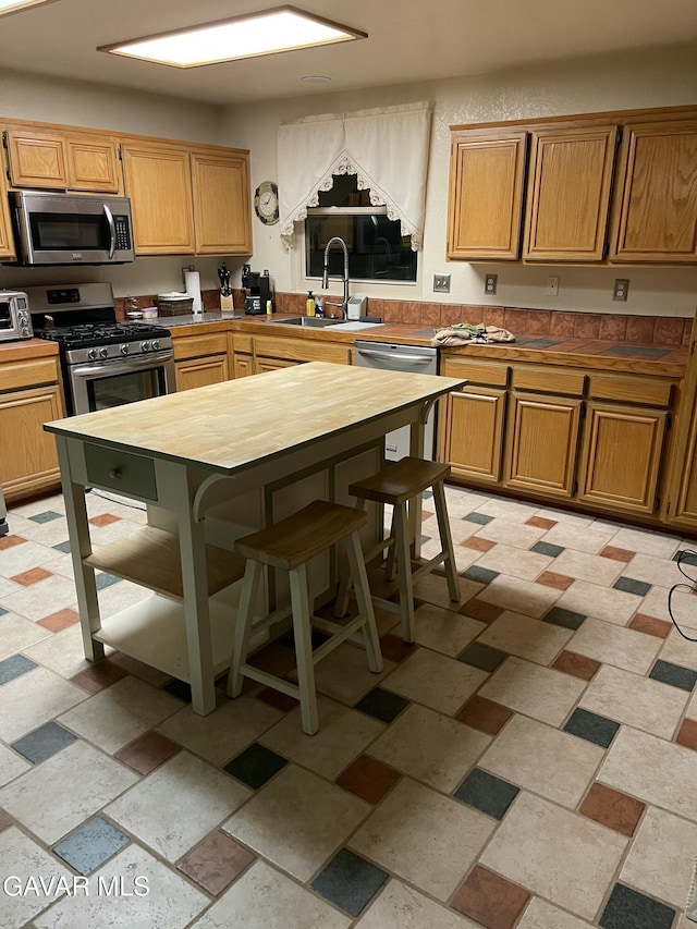 3657 Imperial Ave, Rosamond, CA 93560 - kitchen with appliances with stainless steel finishes and wooden counters
