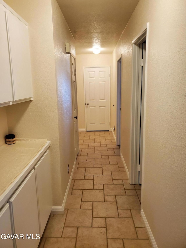 3657 Imperial Ave, Rosamond, CA 93560 - hallway featuring baseboards