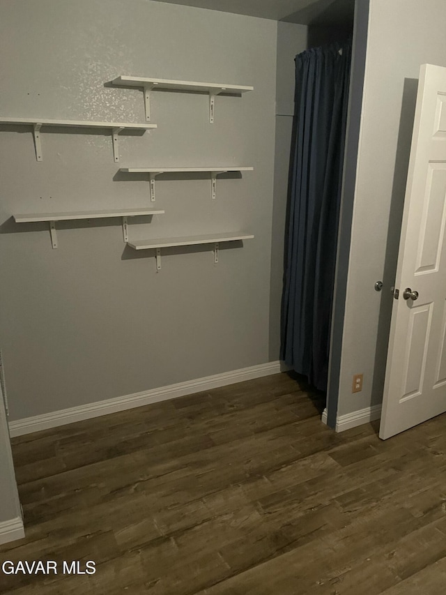 3657 Imperial Ave, Rosamond, CA 93560 - spacious closet with dark wood-style floors