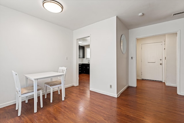 44129 Date Ave, Lancaster, CA 93534 - dining area with wood finished floors and baseboards