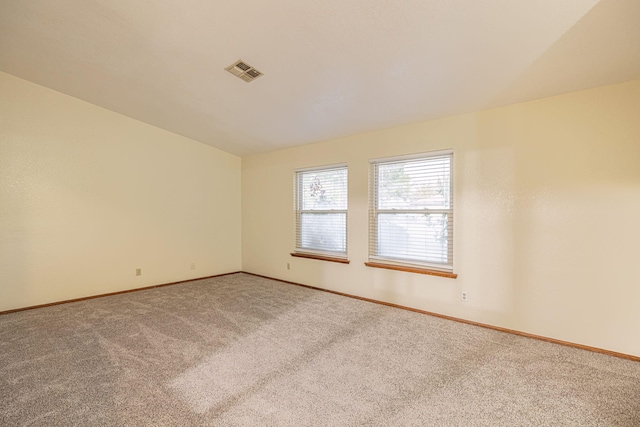 spare room with carpet flooring