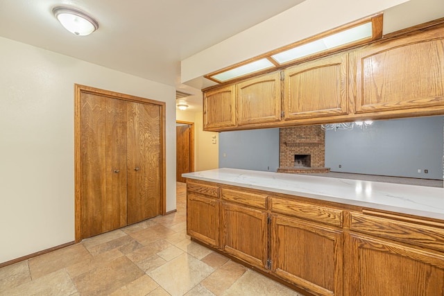 kitchen featuring a fireplace