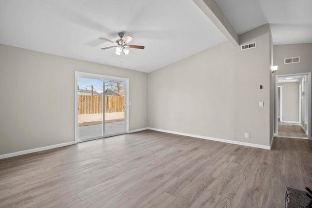empty room with visible vents, baseboards, ceiling fan, and wood finished floors