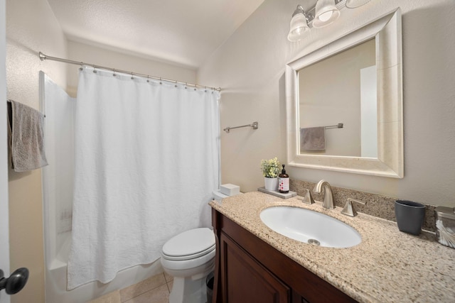 full bathroom featuring shower / bathtub combination with curtain, tile patterned floors, toilet, and vanity