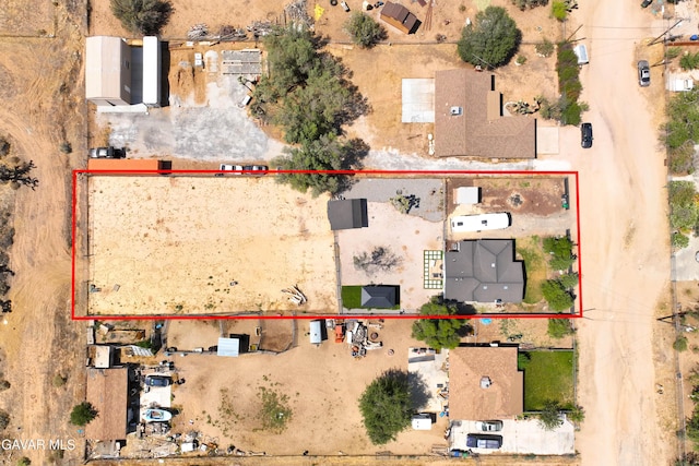 43249 W 42nd St, Lancaster, CA 93536 - aerial view of property and surrounding area featuring property boundaries highlighted and a desert landscape