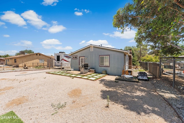43249 W 42nd St, Lancaster, CA 93536 - rear view of house with a patio area