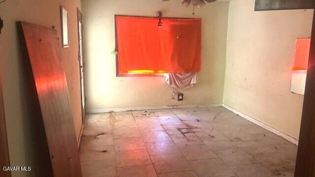 38520 E 12th St, Palmdale, CA 93550 - unfurnished room with ceiling fan and tile patterned floors