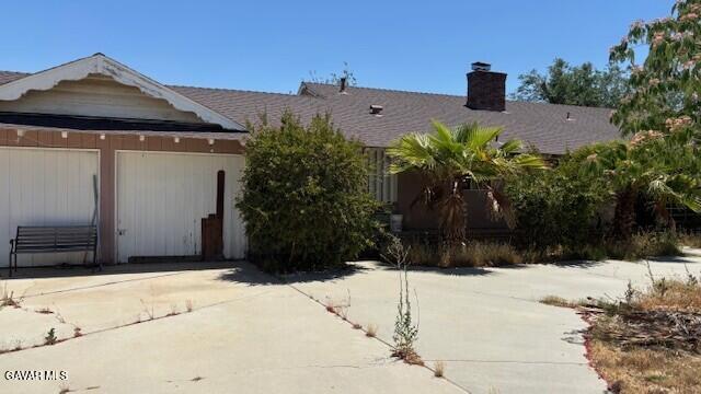 38520 E 12th St, Palmdale, CA 93550 - ranch-style home featuring a chimney