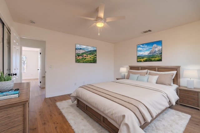 bedroom featuring ceiling fan and light wood-type flooring