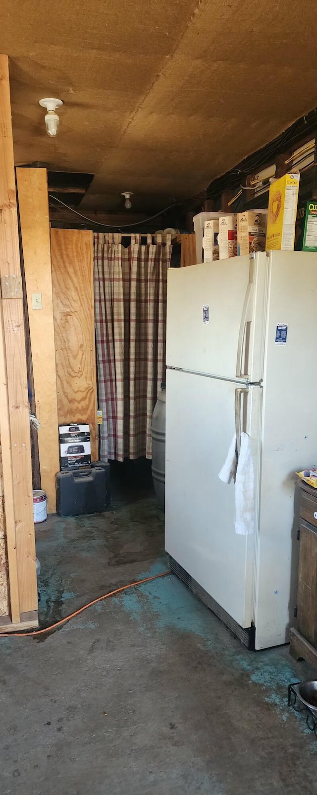 kitchen featuring white fridge