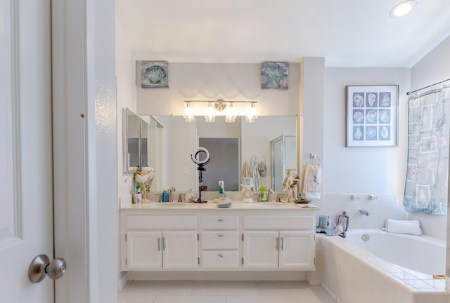 bathroom featuring vanity, tile patterned floors, and separate shower and tub