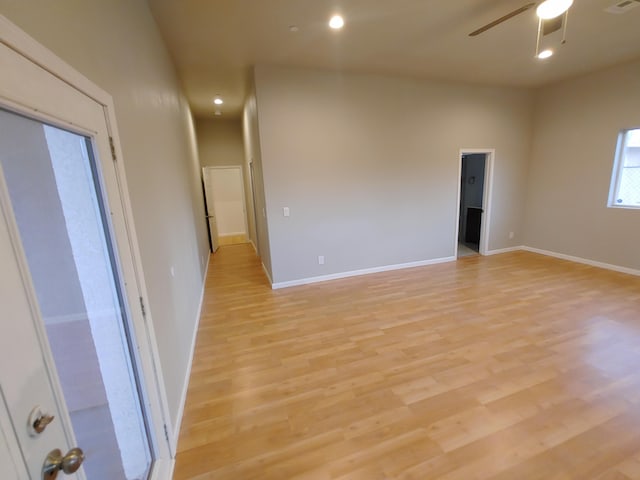 unfurnished room featuring ceiling fan and light hardwood / wood-style floors