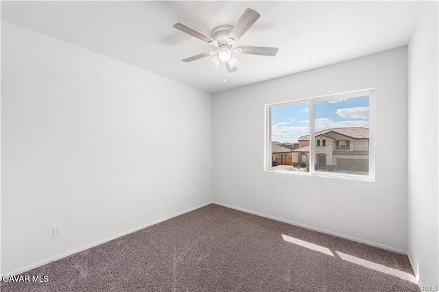 2436 Lugar Bonito Ct, Rosamond, CA 93560 - unfurnished room with carpet flooring and a ceiling fan