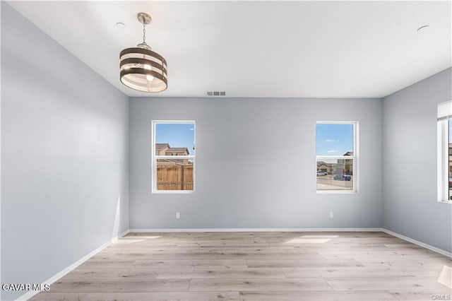 2436 Lugar Bonito Ct, Rosamond, CA 93560 - unfurnished room with light wood-style floors