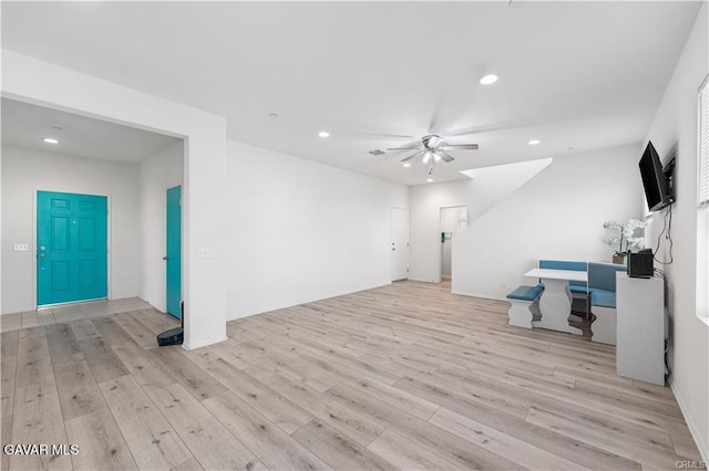 2436 Lugar Bonito Ct, Rosamond, CA 93560 - unfurnished living room featuring wood finished floors, ceiling fan, and recessed lighting