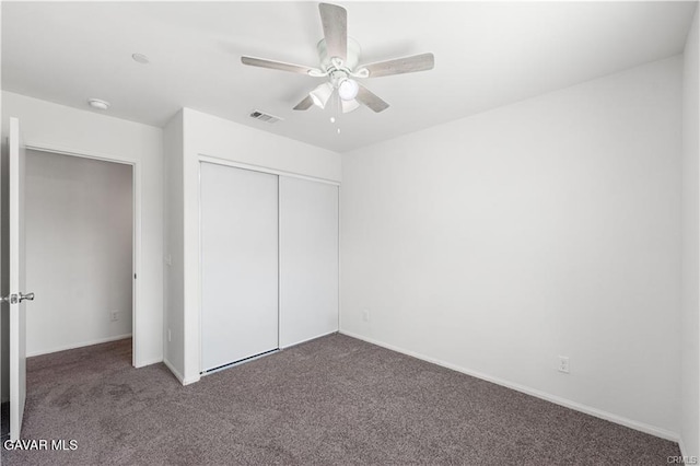 2436 Lugar Bonito Ct, Rosamond, CA 93560 - unfurnished bedroom featuring carpet flooring, a closet, and a ceiling fan