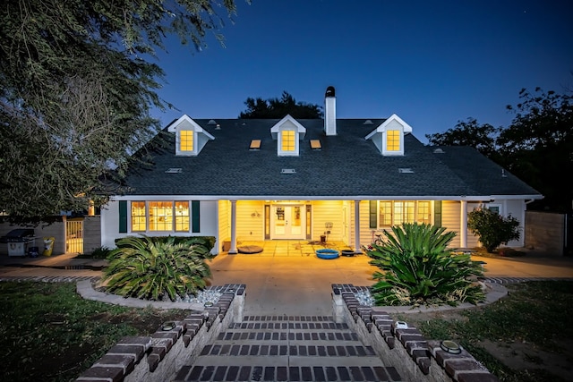 view of front of property with a patio