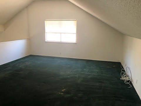 964 Roosevelt St, Ridgecrest, CA 93555 - additional living space featuring lofted ceiling and carpet floors