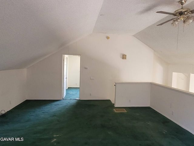 964 Roosevelt St, Ridgecrest, CA 93555 - additional living space with carpet, a textured ceiling, lofted ceiling, and a ceiling fan