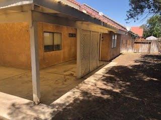 964 Roosevelt St, Ridgecrest, CA 93555 - view of side of property with fence and a patio