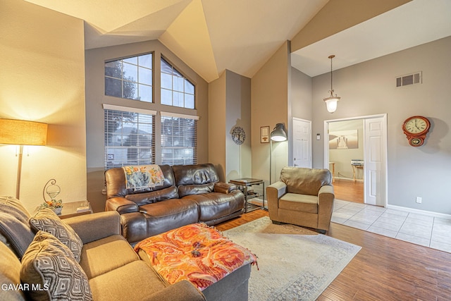 6015 Country Ln, Quartz Hill, CA 93536 - living room featuring high vaulted ceiling and wood finished floors