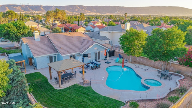 6015 Country Ln, Quartz Hill, CA 93536 - view of pool with a gazebo, a mountain view, a fenced backyard, a residential view, and a patio