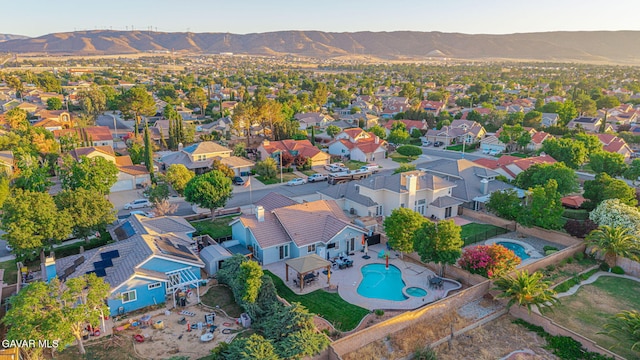 6015 Country Ln, Quartz Hill, CA 93536 - aerial view of residential area with a mountain backdrop